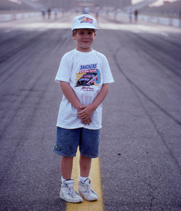 Christopher Graves, age 7, attends a drag race at Texas Motor Speedway in Fort Worth.