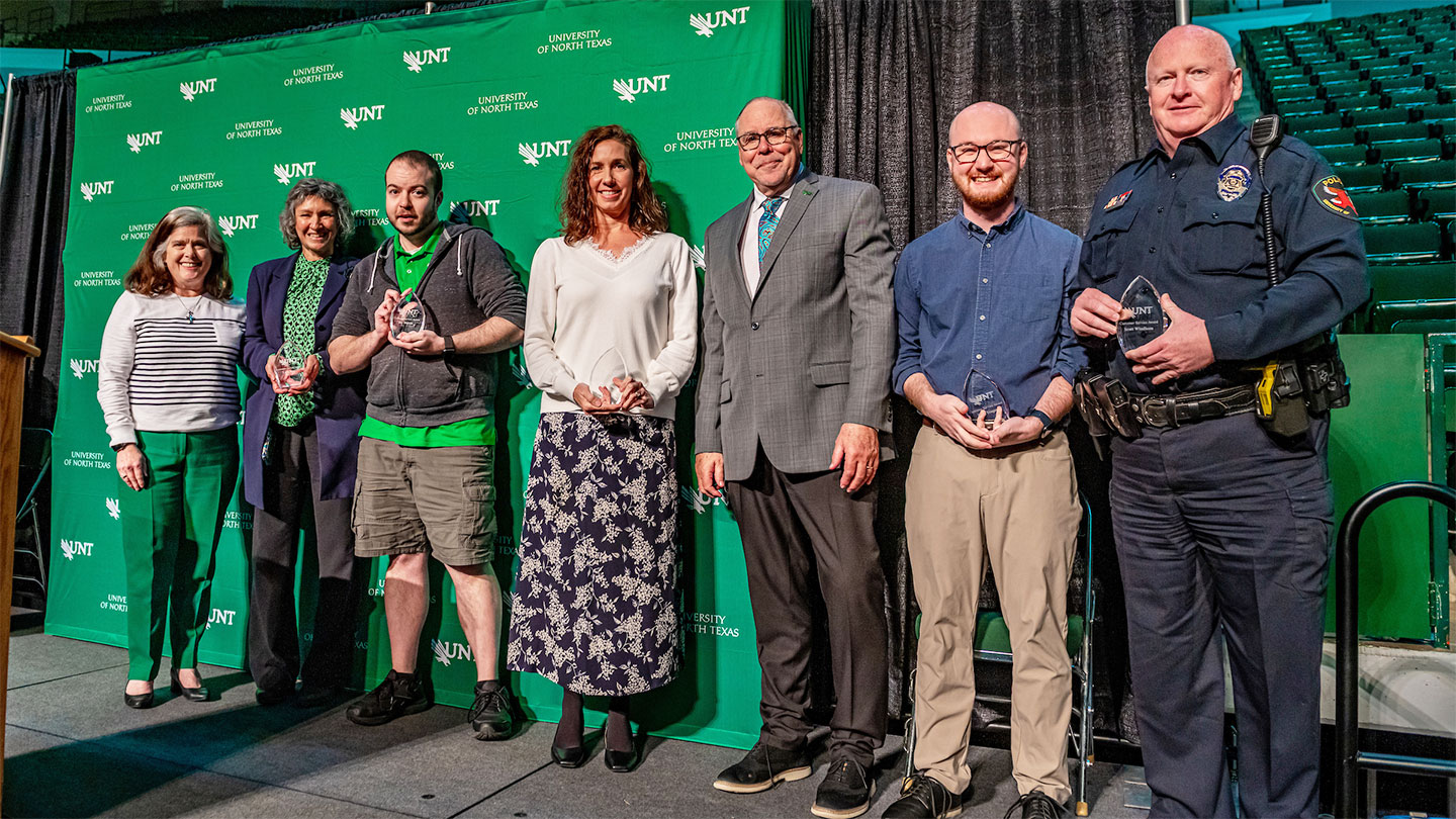 Zach Yeager ('16 M.Ed.) receives the Outstanding Customer Service Award