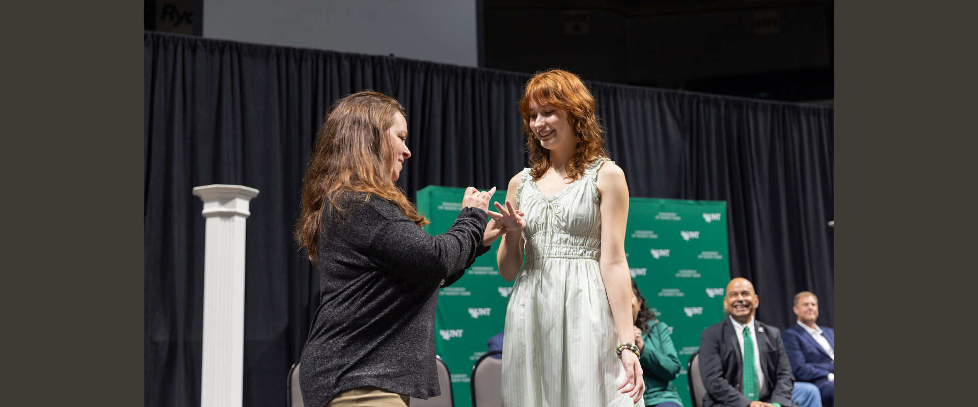 Spring 2025 Ring Award Recipient Gemma Bryant receives her UNT ring.