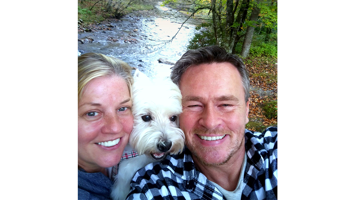 Robert and Kelly Ison with their beloved westie, Abbey.