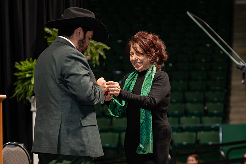 UNT Ring Award recipient Dylan Garcia receives his class ring from his mother at the spring 2026 UNT Ring Ceremony.