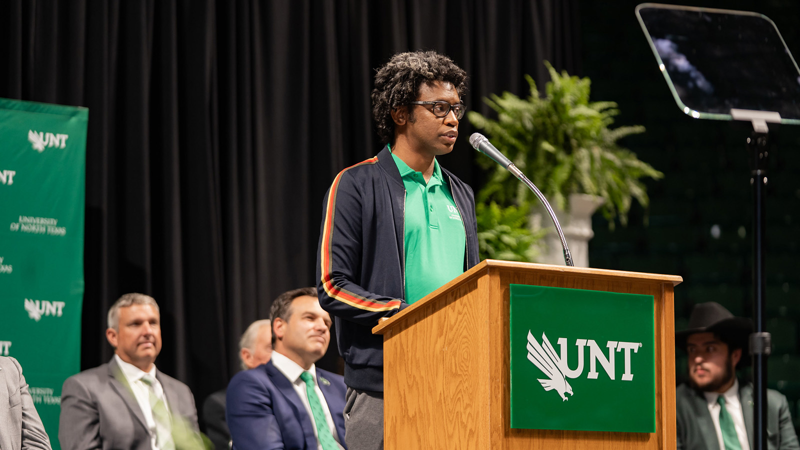 UNT Ring Award recipient Corey Iles ('26) addresses the crowd at the spring 2026 UNT Ring Ceremony
